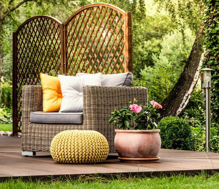 Wood decking with green plants and planter